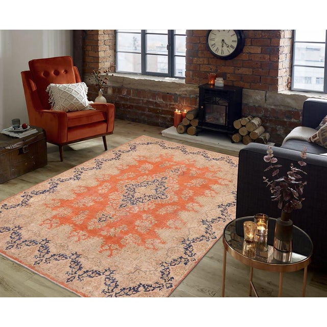 Enhance your living space with this stunning vintage Persian hand-knotted wool rug, a true showstopper that effortlessly...
