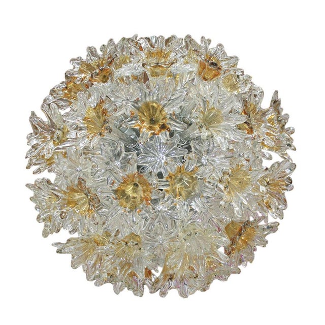 Italian ceiling lamp edited by Venini. Structure made of metal sphere with clear and yellow solid Murano glass pieces with...