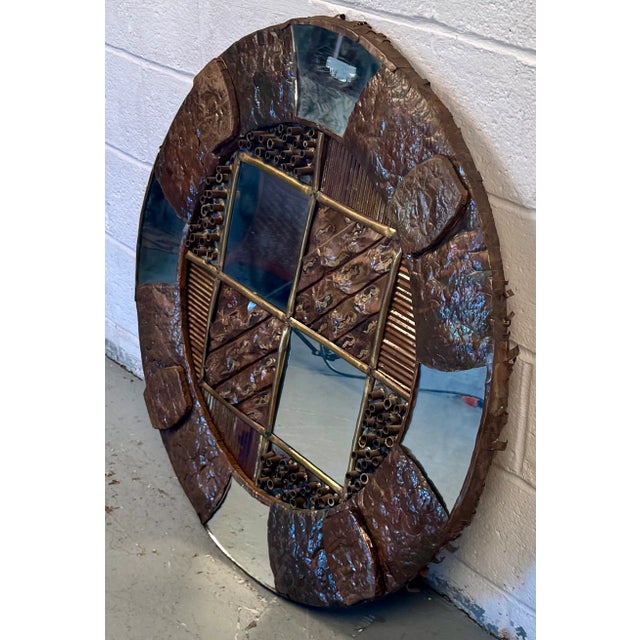 Add a dramatic focal point to your space with this striking Mid-Century Modern Circular Brutalist Mirror, a bold example...