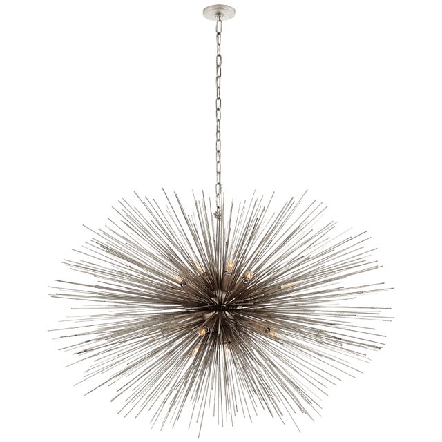Strada Large Oval Chandelier in Burnished Silver Leaf Designer: Kelly Wearstler Canopy: 4.75" Round Mounting: Chain Shade...