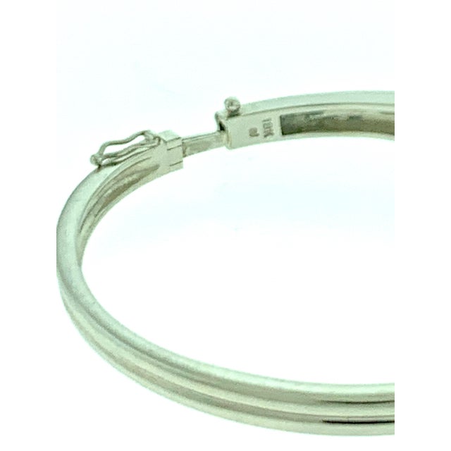 Approximately 2.5 Carat Diamond Bangle /Bracelet in 18 Karat White Gold 32 Grams It features a bangle style Bracelet...