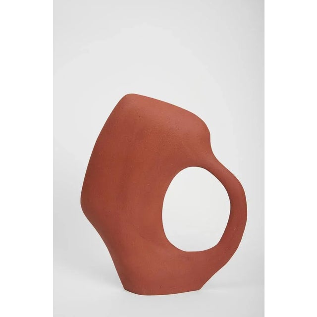 Susan Tribu 33.22 sculpture by Léontine Furcy Unique piece. Materials: Raw red sandstone. Dimensions: L 30 x H 35 cm....