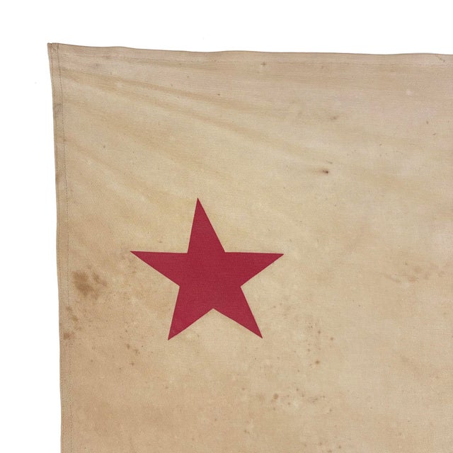 This large vintage California flag is made from a cotton cloth, with sewn stripe and printed bear design visible on both...