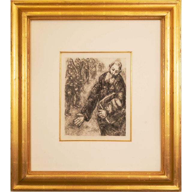 A religious modern etching on paper titled “Josue lit les Paroles de la Loi / Joshua Reads the Words of the Law” by Marc...