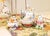 This authentic porcelain ensemble represents the celebrated novelty tableware lineages produced by renowned British...