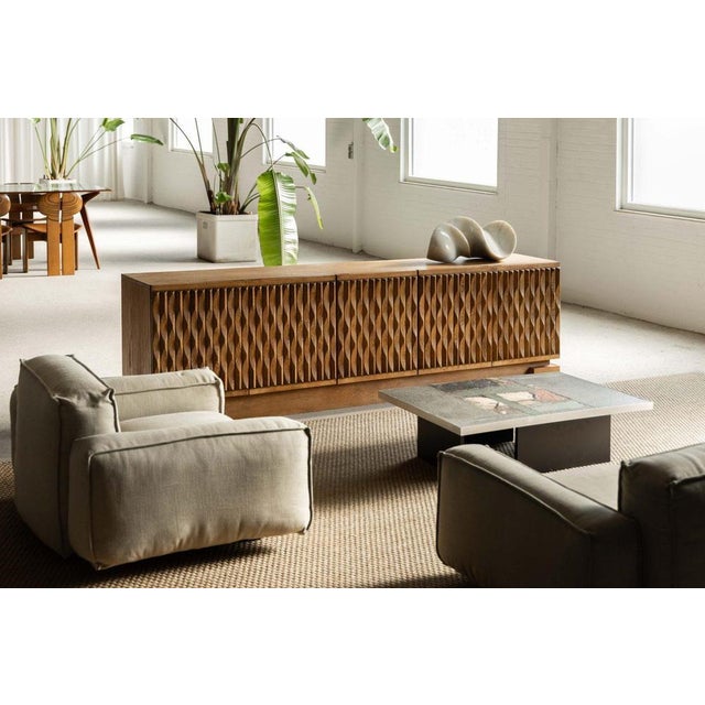 A rare and masterfully crafted example of Belgian brutalist design from the 1970s, this five-door sideboard from the...