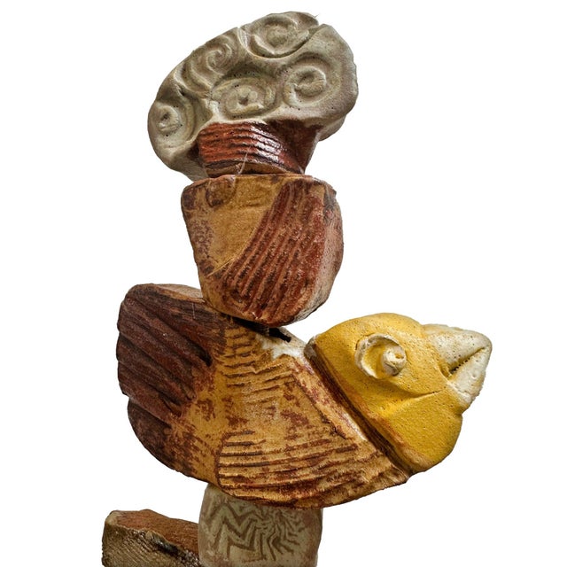 At 31 inches on a natural wood base this smaller totem has an intimate, meditative quality that the larger floor...