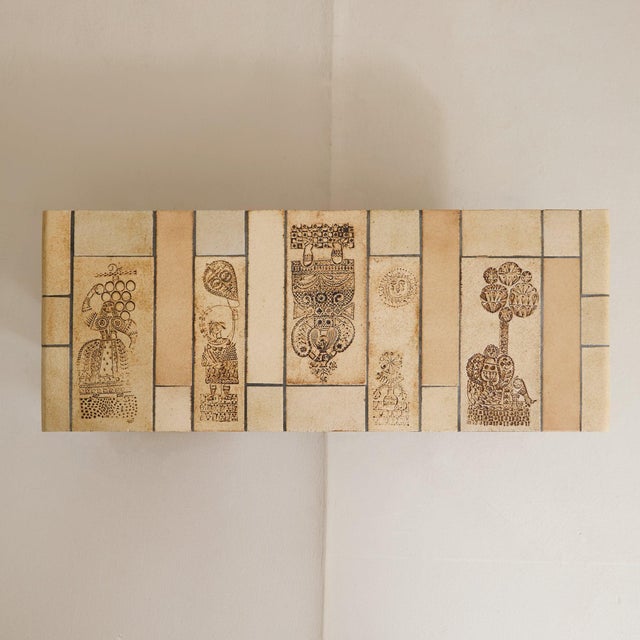 A French ceramic tile coffee table by Roger Capron, crafted in Vallauris in the 1970s. The surface is composed of hand-...