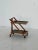 Simple and elegant elegant carrying trolley, Norda production, late 1980s. Made with a wooden structure and two shelves of...