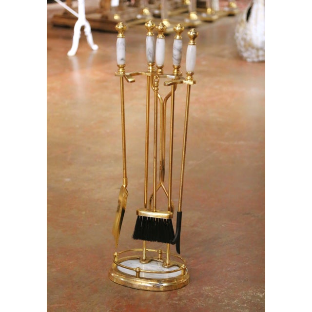 Decorate a hearth with this elegant antique fireplace companion set. Crafted in France circa 1950, the Mid-Century...