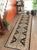 Enhance the ambiance of your home with this magnificent Persian-influenced Turkish hand-knotted rug made by skilled...