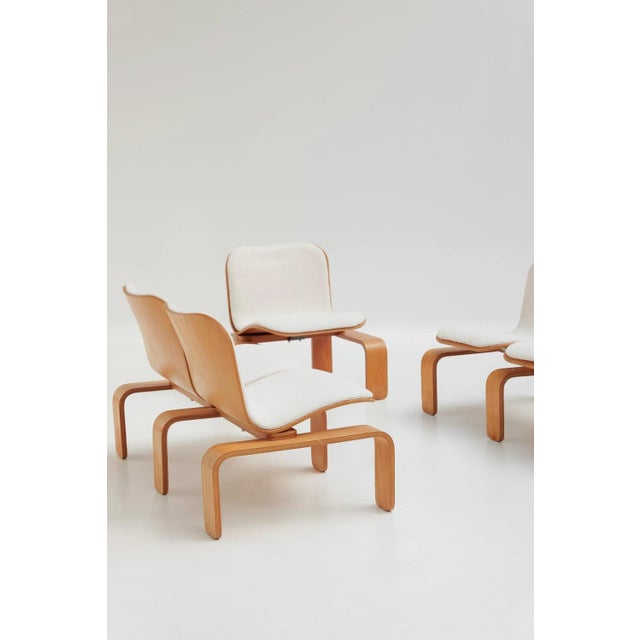 Living room set comprising two benches and an armchair, designed by Jean-Michel Chaudeurge and produced by Steiner....