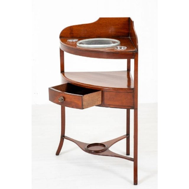 Mahogany Regency Corner Washstand. Comprising of an undertray, a single Oak lined drawer with ornate brass knob and...
