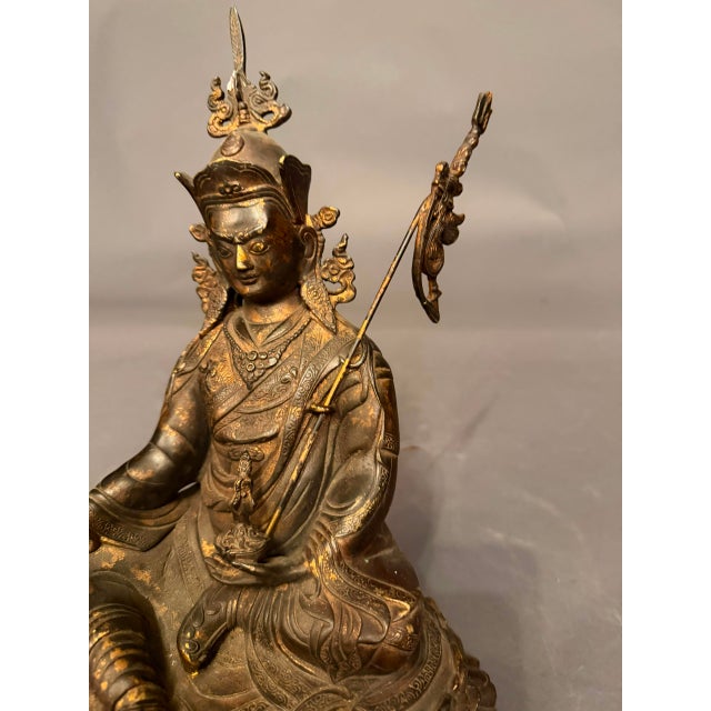Intriguing early 20th-century bronze figure with a Buddha-like form, believed to date to circa 1920s. The sculpture...