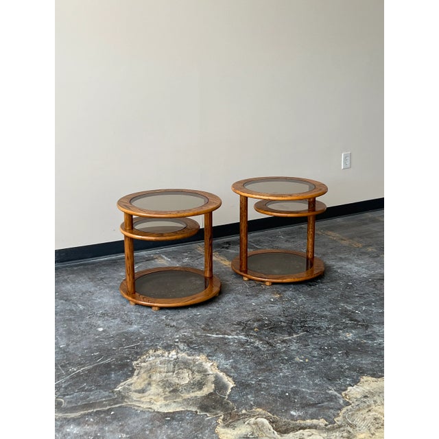 Postmodern oak and smoked glass tri-level swivel side table. Top and bottom levels are stationary and smaller middle level...