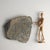 Sculpted and painted slate mani stone depicting avalokiteshvara, the bodhisattva (buddhist deity) of compassion. The...