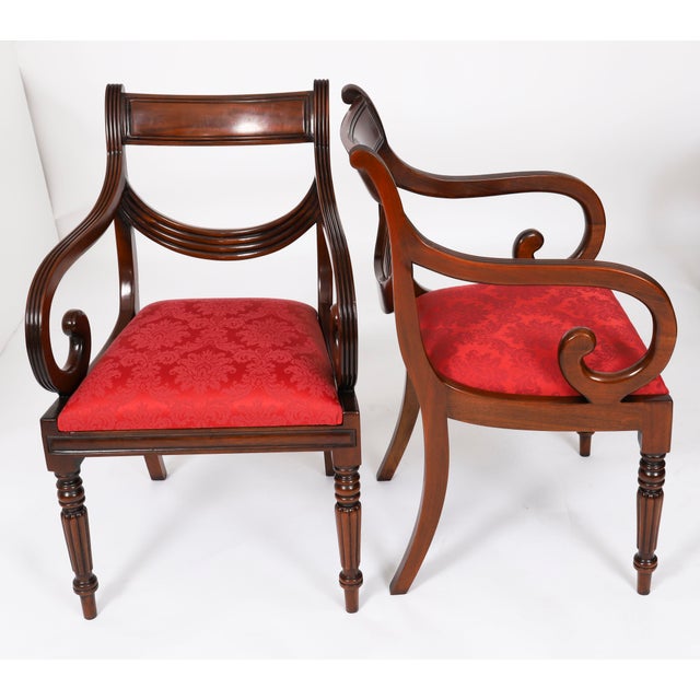A delightful vintage set of twenty two superb swag back dining chairs, dating from the second half of the 20th century....