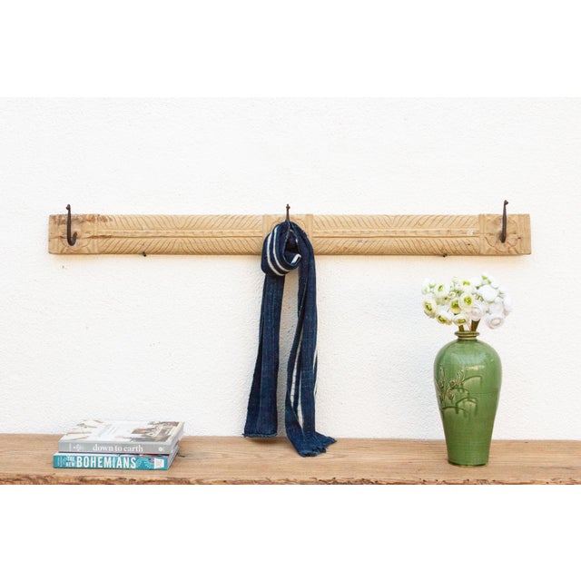 Add a touch of rustic charm to your home with this unique wall hook. Crafted from an antique southern Indian door lintel,...
