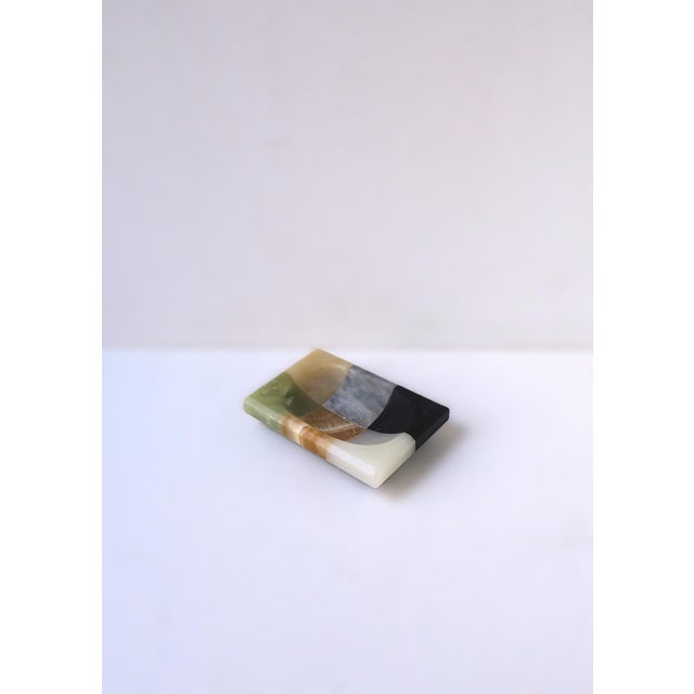 A rectangular footed marble and onyx soap dish, Postmodern design period, circa late-20th century. Vessel is rectangular,...