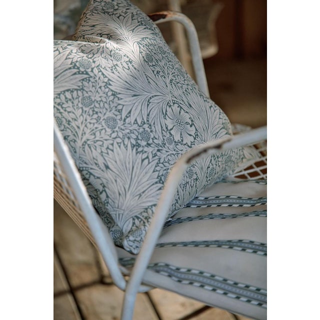 Originally imagined as a furnishing fabric Marigold is an 1875 William Morris design filled with charm and energy....