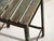 This antique industrial stool in pine wood and iron is an industrial seat with a tubular iron frame and a pine slatted...