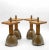 A set of four Brutalist brass and solid oak candlesticks. Circa 1970. There are a few signs of use to the finish as...