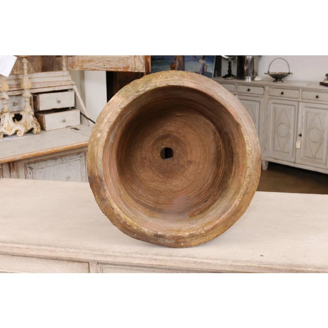 A French Provincial Anduze vase from the early 19th century with traces of green and brown glaze and nice rustic...