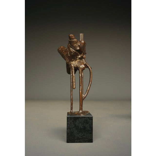 A bronze sculpture by the self taught artist Jetty Homan (1912-1996). This piece is a small small cast of the outdoor...