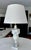 Single smaller scale vintage Italian Neoclassical style table lamp made from hand-carved alabaster, featuring a urn-shaped...