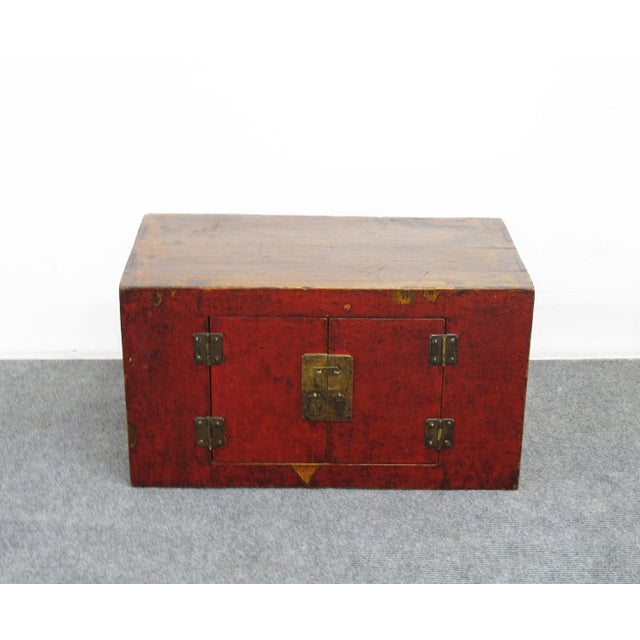 Adorn by well aged rich red color, lovely patina and texture, this early 19 antique red Asian cabinets will be a gorgeous...