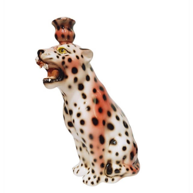 A marked ceramic leopard candle holder by boxer ceramiche, made in italy and approximately dating to the late 20th...