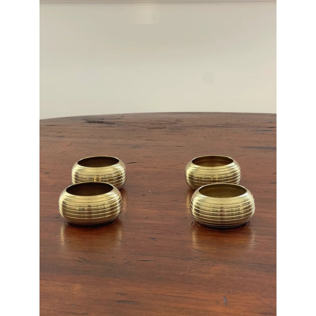 Whether hosting twelve or fewer, this set of twelve brass napkin rings with etched stripes works for gatherings large and...