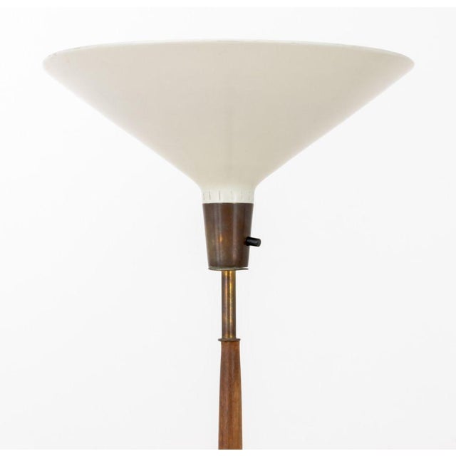 Gerald Thurston for Lightolier Tripod Wood Floor Lamp, with patinated white metal shade on brass base. 67" H x 17.5" W x...