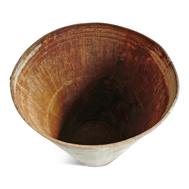 Beautifully aged vintage French galvanized metal bin featuring a softly tapered silhouette and timeworn patina rich with...