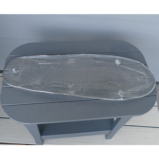 Bring classic Scandinavian design to your table with this vintage Pukeberg Swedish glass fish serving platter. Crafted in...