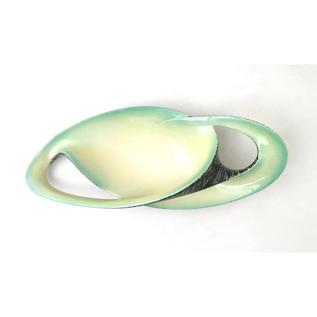 Made in Italy, 1950s. This stunning and elegant centerpiece is made in lacquered ceramic and is signed by the maker. It is...