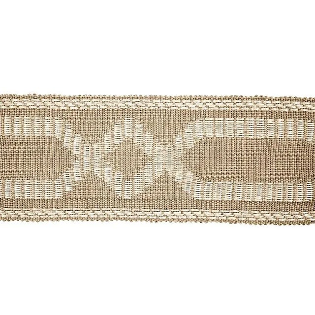 A simple tone-on-tone geometric accessory packs another layer of interest thanks to a rich, raffia-like texture. Sold as a...