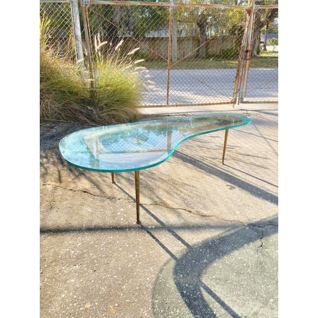 Rare Boomerang Coffee Table With Thick Glass Top + Tall Brass Legs | Mid Century Modern For Sale - Image 10 of 13
