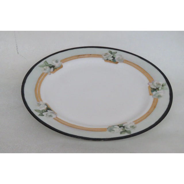 This beautiful plate is made of porcelain. This piece is stamped as being made by Haviland in France, see pictures, and...