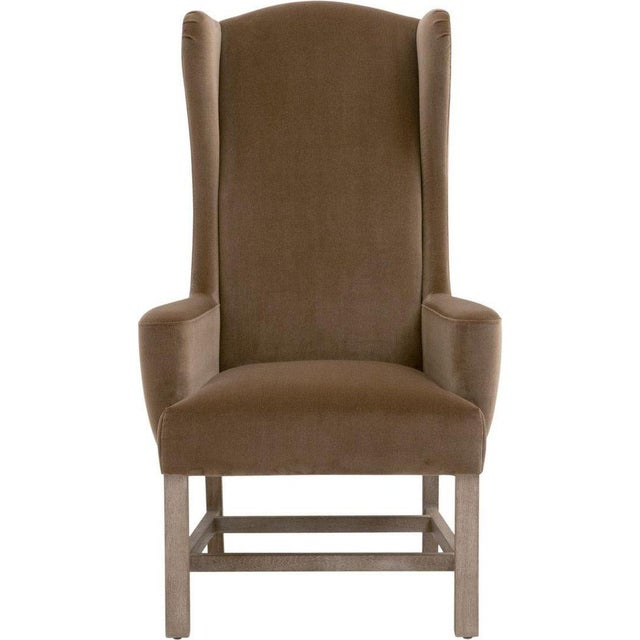 The Bennett Arm Chair brings by Essentials For Living a touch of elegance and comfort to any room. Upholstered in a rich...