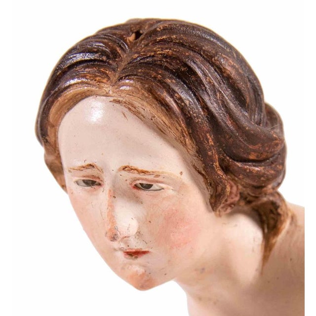 Head of woman man realized in polychrome ceramic with glass eyes. Neaples, 18th Century. Very good condition.