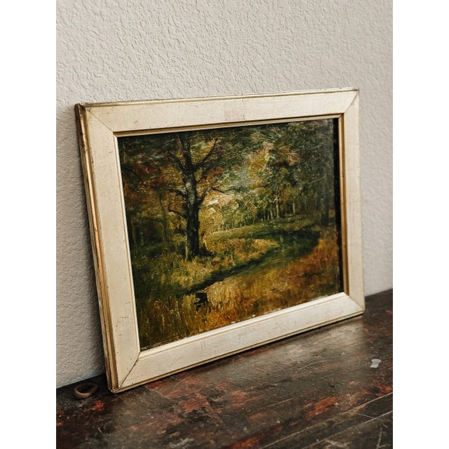 An incredibly stunning original English oil painting signed by H. Simpson. This mid century piece features a winding creek...