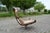 This Swivel Lounge Chair was designed by Ake Fribytter for Nelo, Sweden. It has of lightful design with beautiful wooden...
