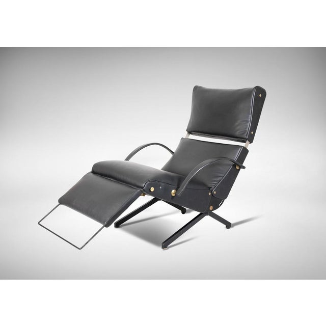 Vintage p40 adjustable armchair realized by osvaldo borsani for tecno, 1956. First edition of this iconic armchair, in...