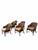 Iconic set of six McGuire toboggan dining chairs featuring a midcentury modern barrel back form rattan frame. Model...