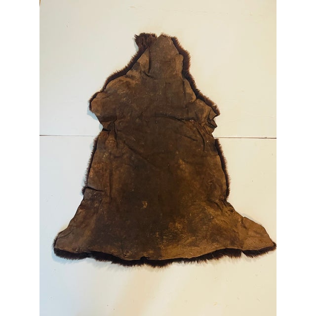 Beautiful deep chocolate brown color silky soft shearing fur natural organic throw.