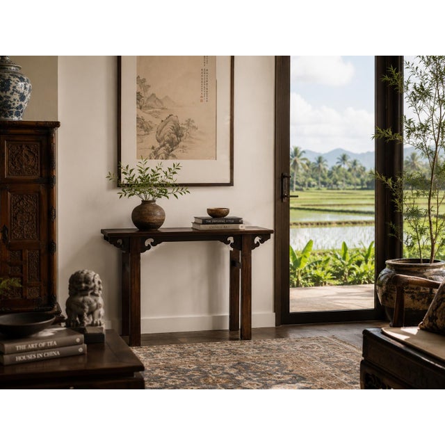 A beautiful late 19th century wine table from Northern China. The tabletop is constructed of four members joined by...