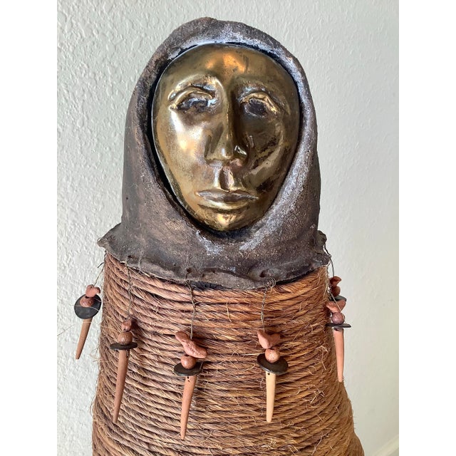 A striking and highly textural monumental figurative sculpture by American artist Naida Seibel, signed and dated (’88?) at...