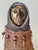 A striking and highly textural monumental figurative sculpture by American artist Naida Seibel, signed and dated (’88?) at...