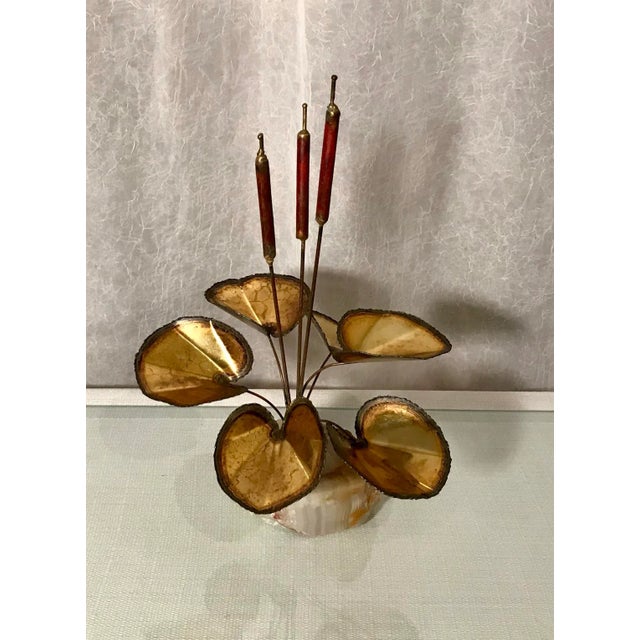 Vintage, mid-century, brutalist, torch cut brass cattail sculpture. Attributed to Curtis Jere. This piece is unsigned. The...